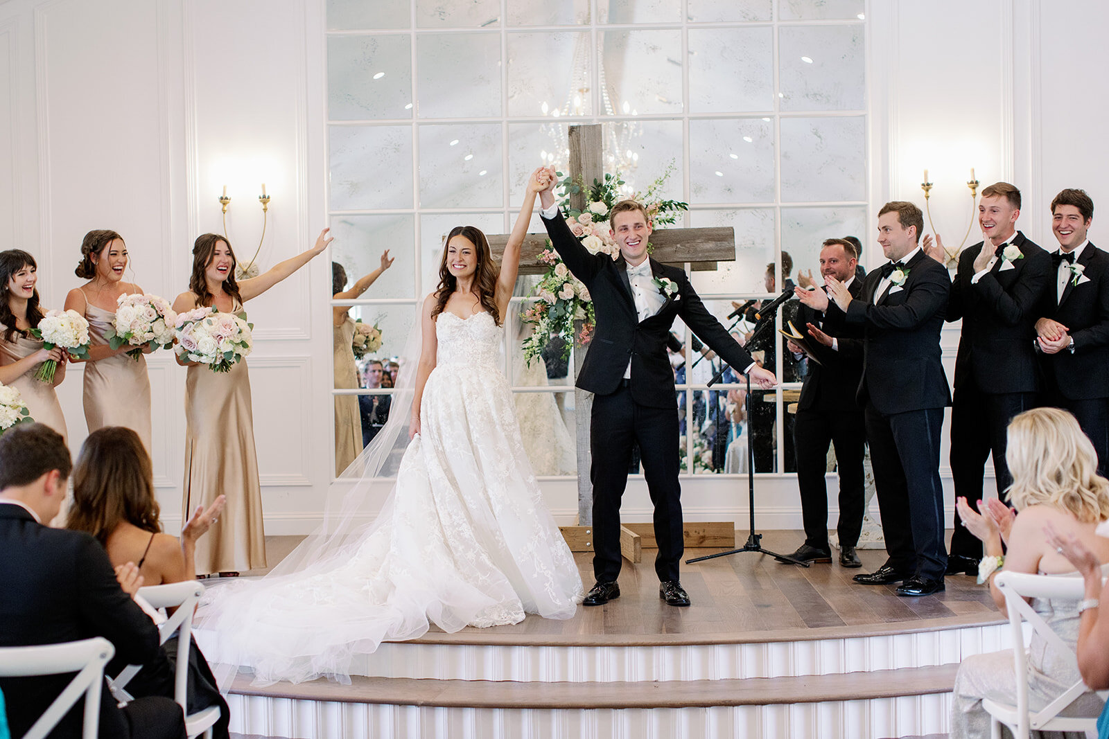 happy bride and groom in wedding chapel