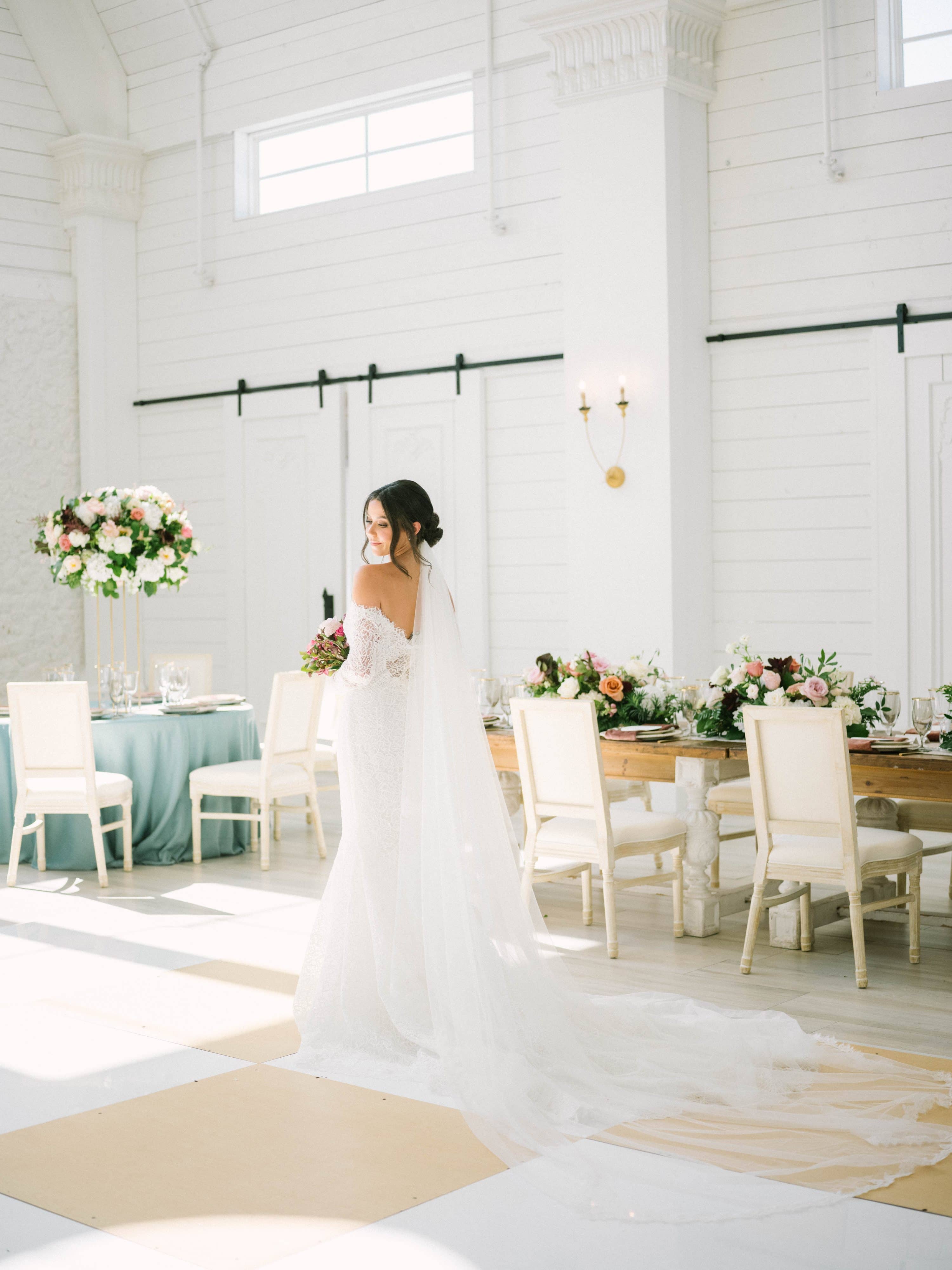 bride standing in The Nest indoor wedding reception space